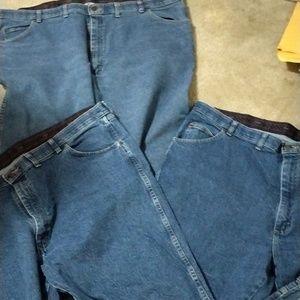 4 pair Wrangler relaxed fit jeans
